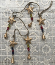 Load image into Gallery viewer, Bells Stars on 85cm String  Jute and Iron
